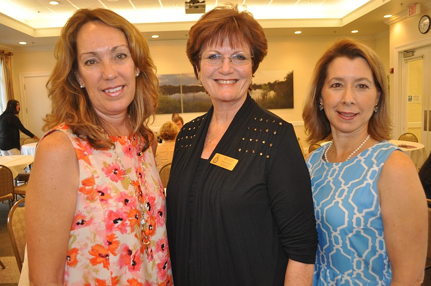 Judy Bokorney and Joyce Scott of Catholic Charities and Cassandra Holmes of the Manatee Community Foundation
