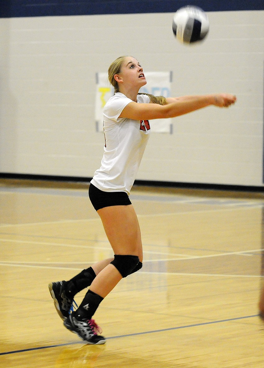 Cardinal Mooney sophomore Keri McMahon saves a point during the second set.