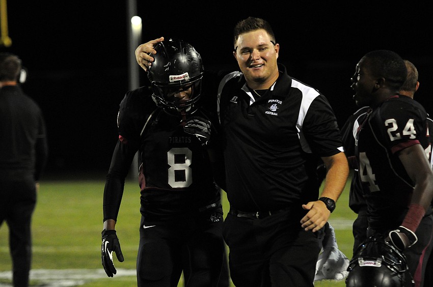 Braden River linebacker Jimiah Albritton is congratulated following his 36-yard interception return for a touchdown in the second quarter.