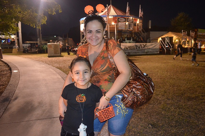 Yener and Amanda Fiqueroa dressed for fall