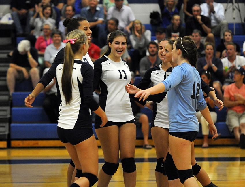 The ODA volleyball team celebrates a point during its 3-1 victory over Calvary Christian in the Class 3A-Region 3 quarterfinals Oct. 29.