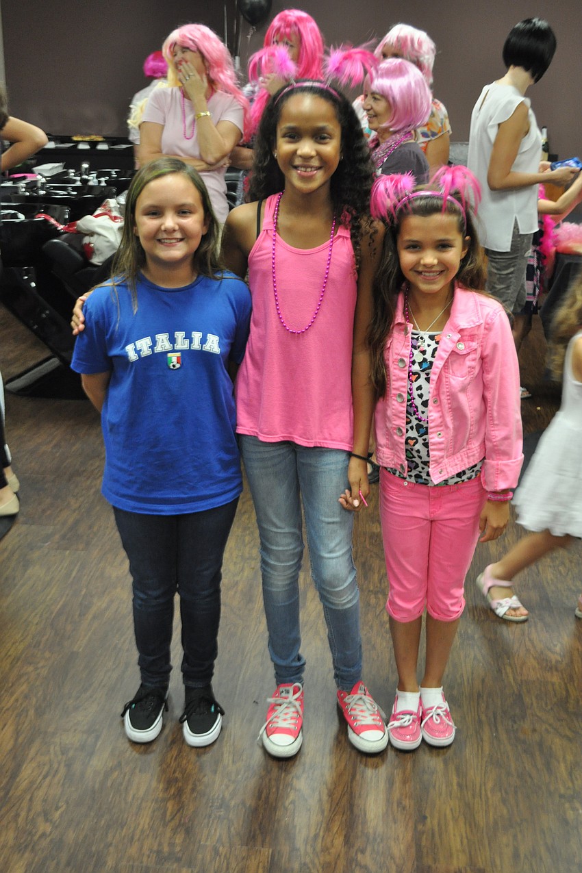 Ten-year-olds Alyssa Andersen, Alyssa Martin and Bella Rogers prepare for the rigatoni relay.