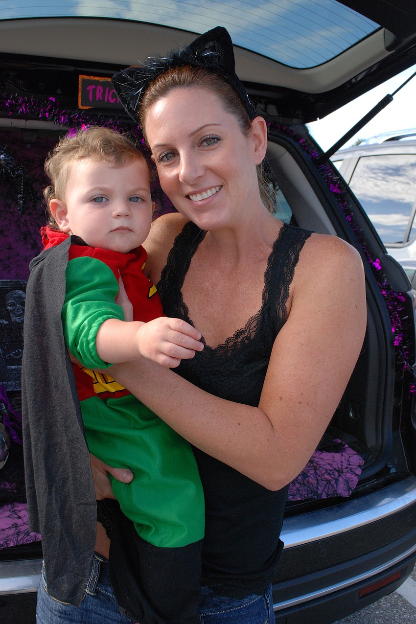 One-year-old old Hayden Laning, as Robin, with his mom, Kelly.