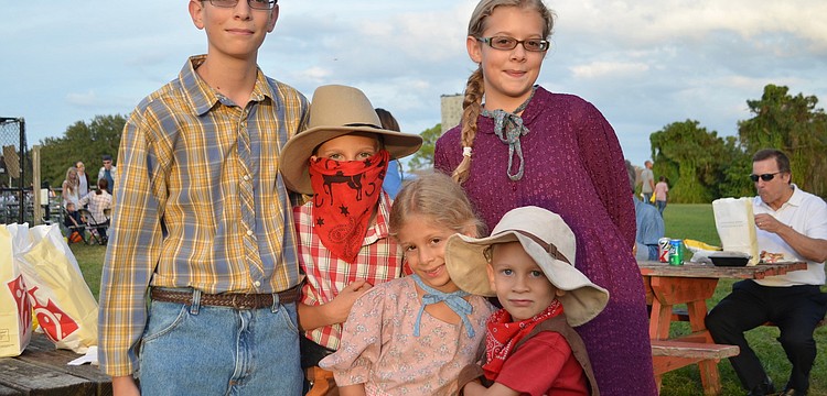 Caleb, Cole, Leah, Lindsey and Calvin Canna all dressed to the â€˜Wild West Festâ€™ theme of Tabernacleâ€™s Night of Light Family Fall Fest.