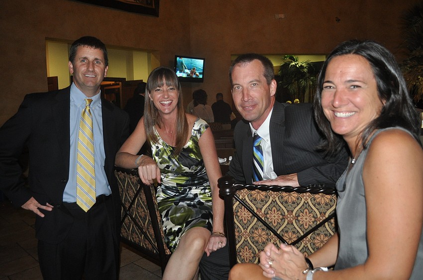 Peter and Carey Geaglone and Craig and Angela Van Nortwick all have children who attend McNeal.