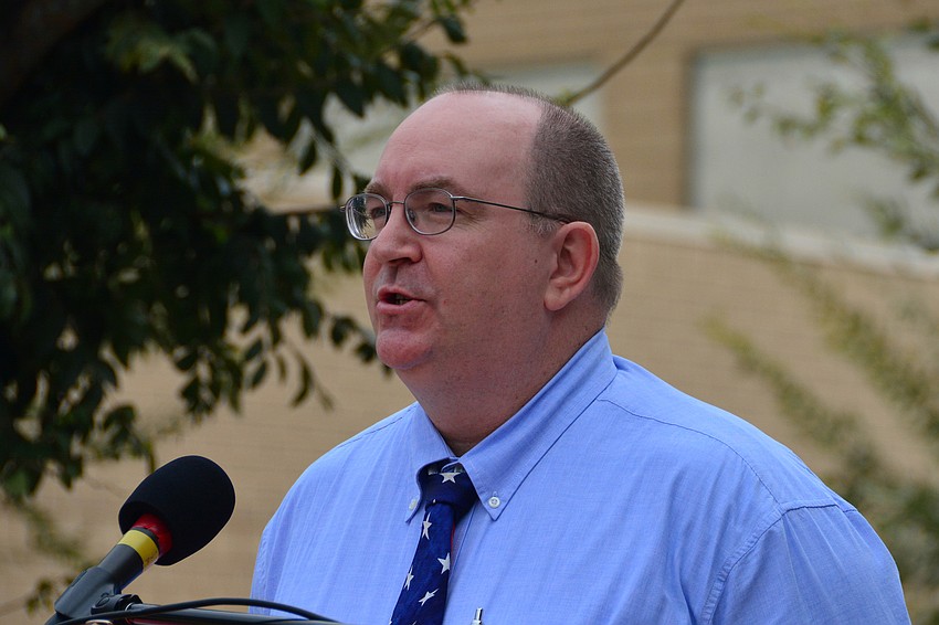 Teacher Christopher Brown, a veteran, shared the history of Veterans Day.