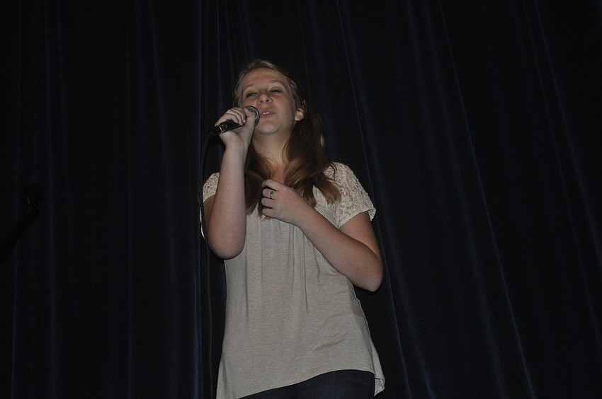 Molly Coston, a seventh grader, sang the song, â€œSkyscrapper.â€