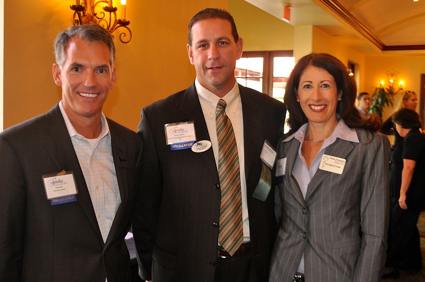 Steve Hall, Darren Inverso and Robin Fernandez chat before the ceremony gets underway.