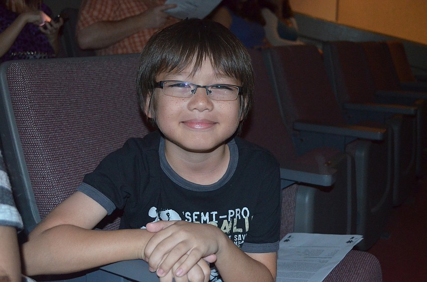 Mathew Callen is excited to watch his brother play the trombone.