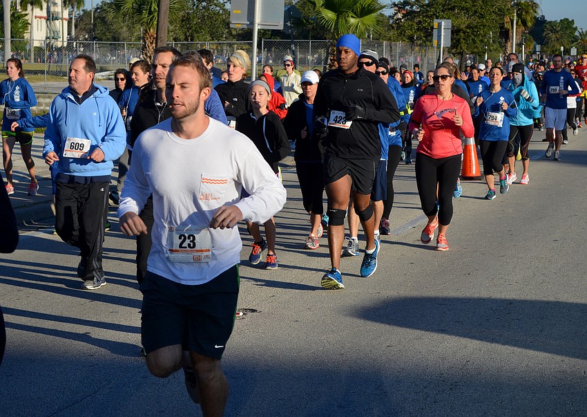 Runners pound the pavement for the Turkey Trot 5K.