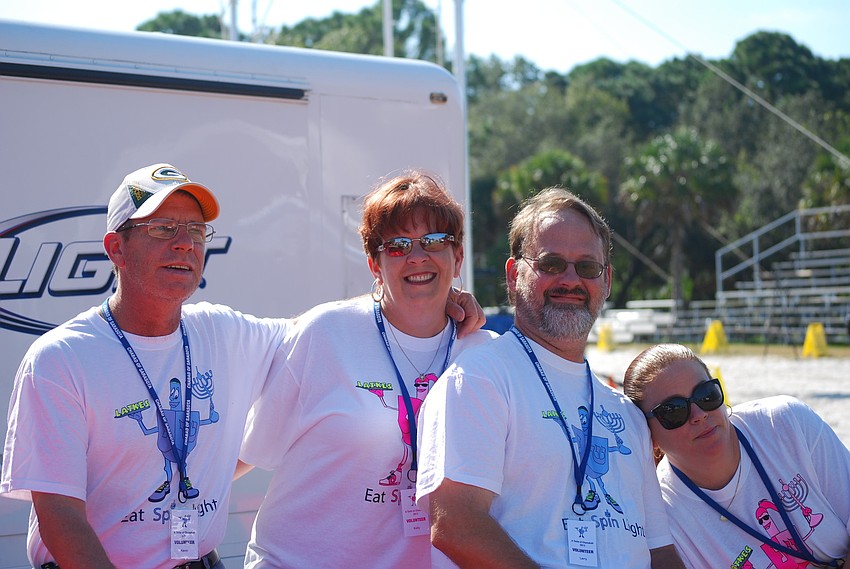 Four of the 60-plus Volunteers assisting Chabad of Sarasota with the festival.