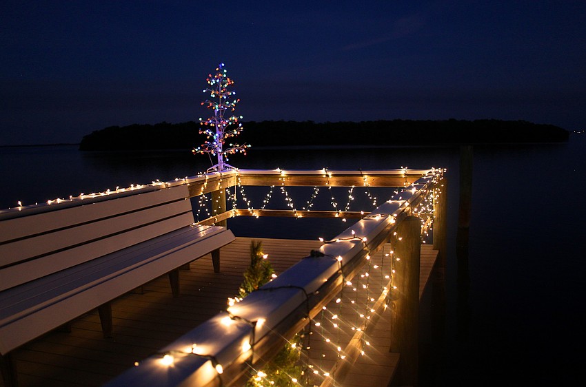 One of the docks lit up at twilight.