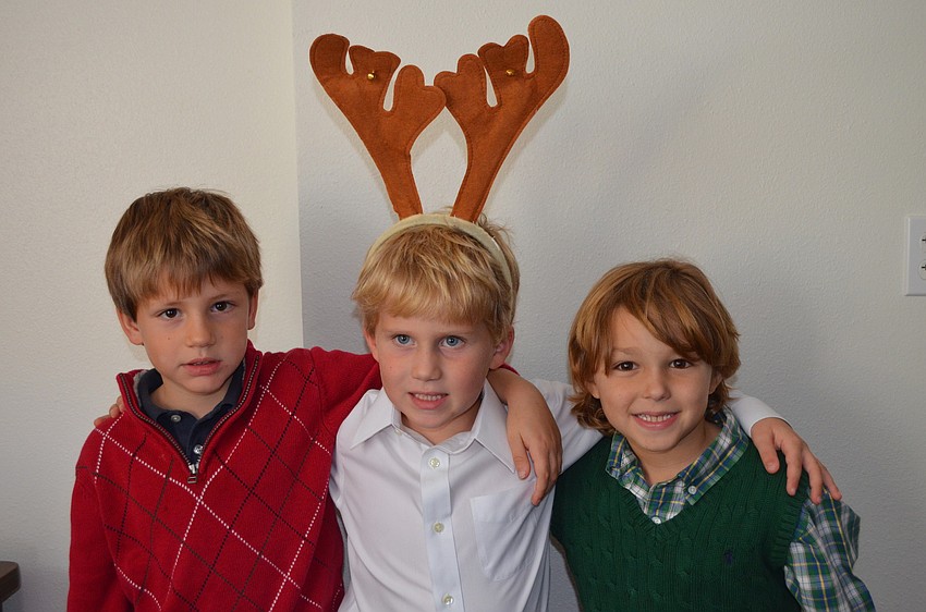 James A., Winston C. and Ryan B. dressed festively.