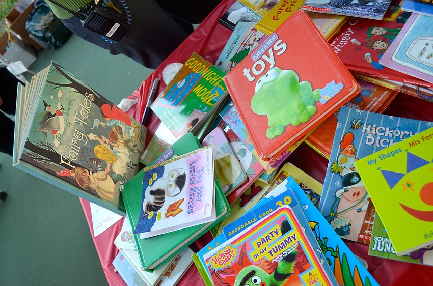 Books fill tables at the event, free for the grabbing.