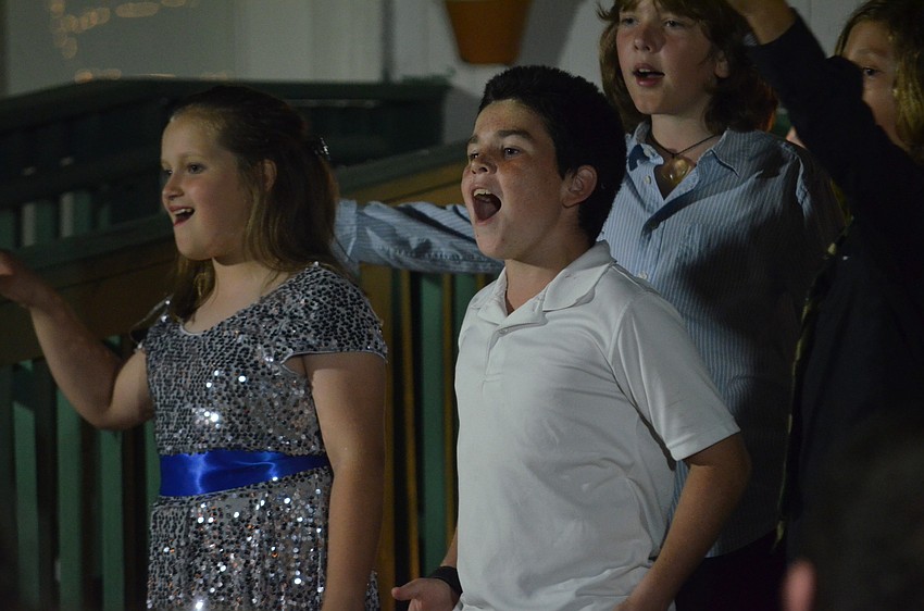 Aiden Pearson sings.