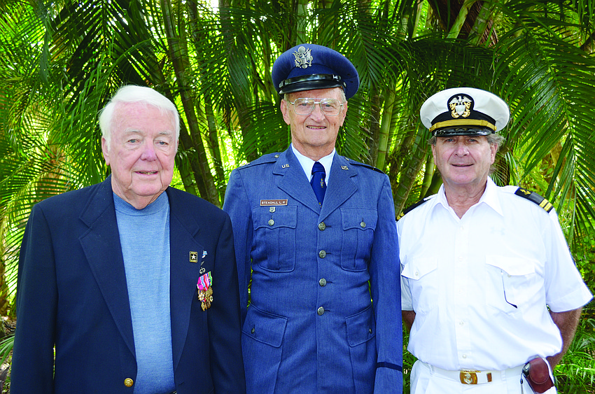 Gen. John Casey, Dr. Larry Steagall and Dr. William Evanko attend Longboat Island Chapel's Veterans Day tribute Nov. 11, during which the Rev. Vincent Carroll, a U.S. Navy veteran, spoke about his wartime experience.