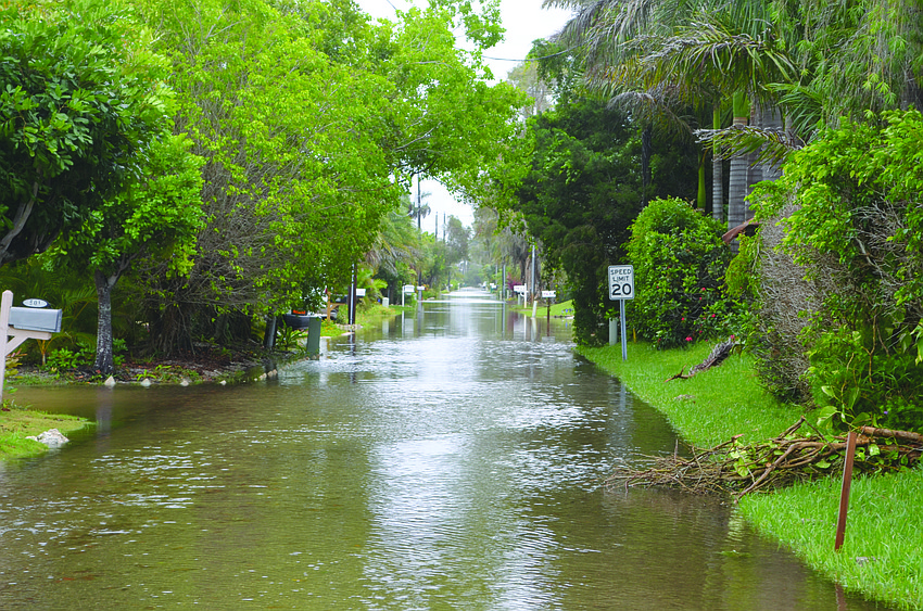 Norton Street, along with other streets in the Longbeach Village and Sleepy Lagoon, floods June 6, as the result of strong winds and rain caused by Tropical Storm Andrea. 7