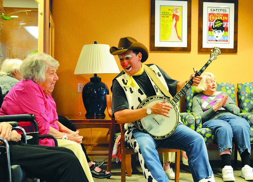 Todd Steinberg sings and plays the banjo in April for Kobernick-Anchin residents. Steinberg is one of the founders of Laughter Unlimited, a humor therapy program that pays daily visits to hospitals, nursing homes and assisted-living facilities