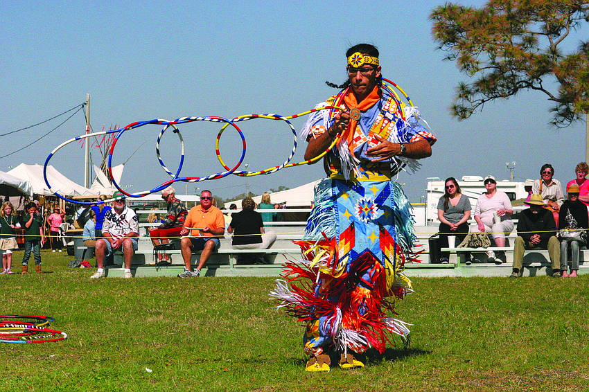 David Wittmar tells his life story through a traditional hoop dance during the Native American Festival in January.