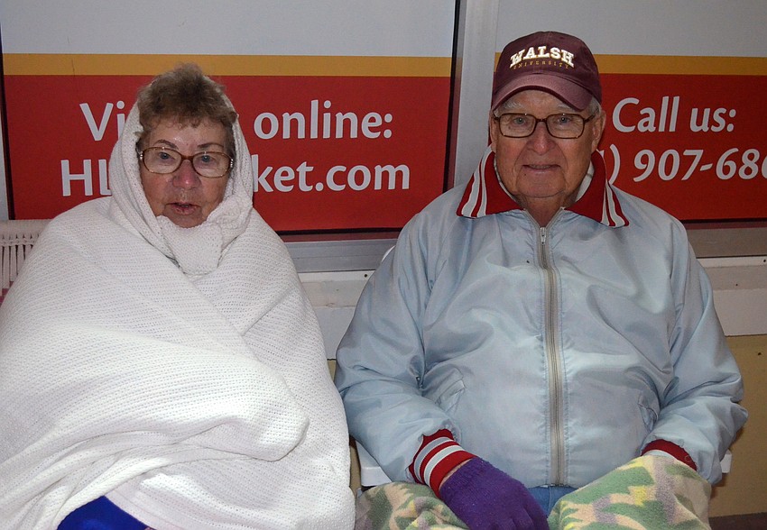 Martha and George Hitchcock try their best to stay warm.