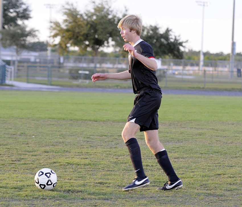 Braden River senior defender Jared Bieber sets up a play for the Pirates in the first half.