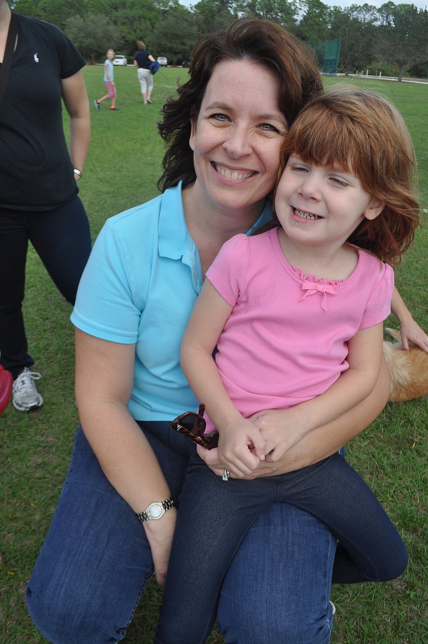 Nancy and Kimberly Lavick wait in line for face painting.