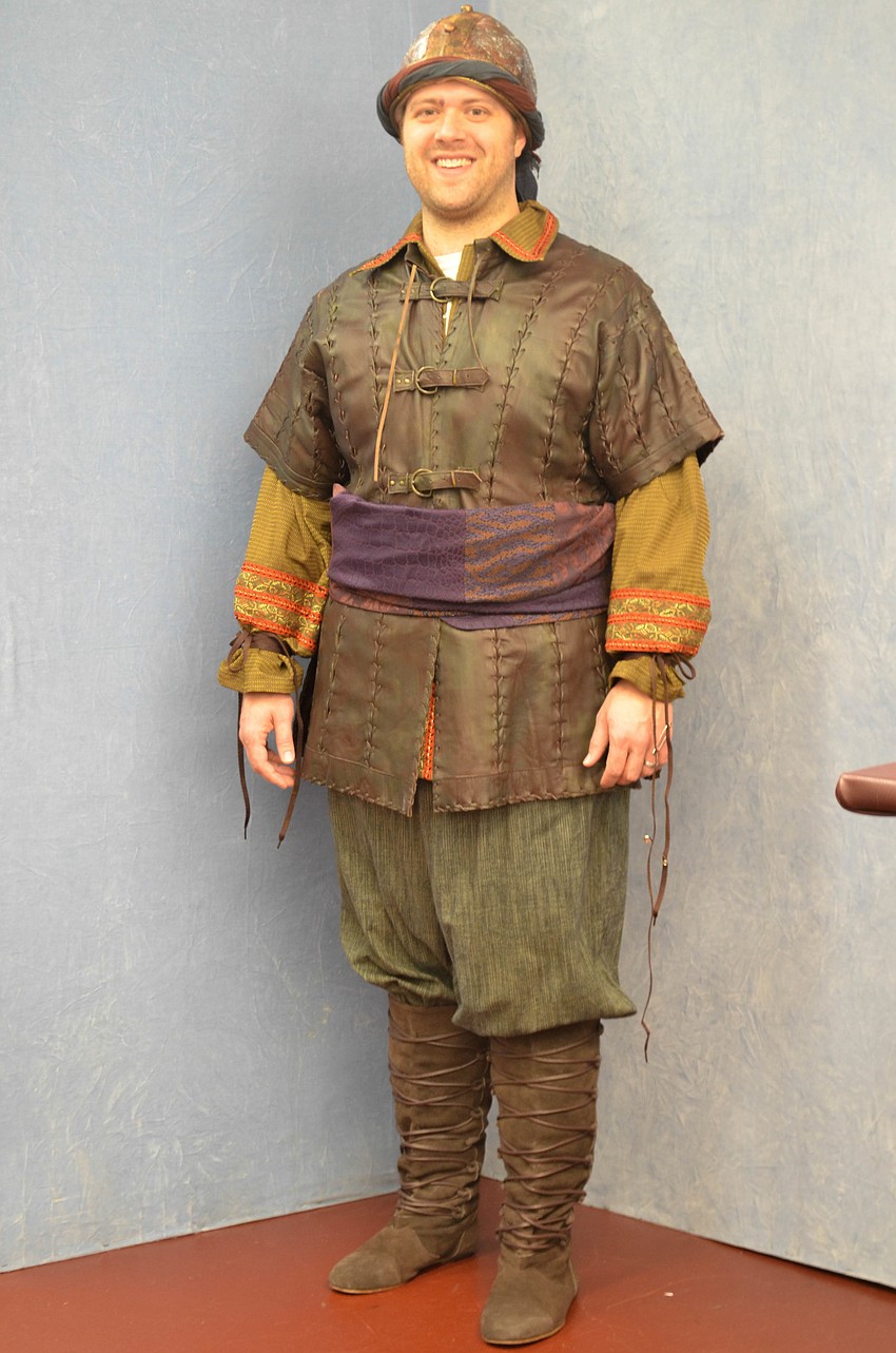 Singer Keith Brown shows off his fitted costume