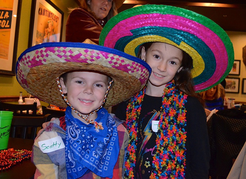Siblings Scotty Walters, 5, and Tesa, 8, show off their sombreros.