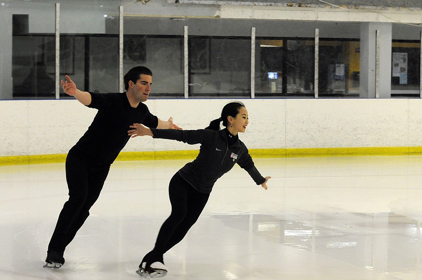 U.S. pairs figure skaters Nathan Bartholomay and Felicia Zhang rehearse part of their routine during an open training session Jan. 22, at the Ellenton Ice and Sports Complex.