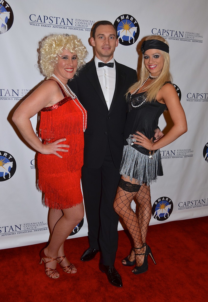 Katie Raymond struts her stuff beside Maks Lototskyy and Sarah Haworth.