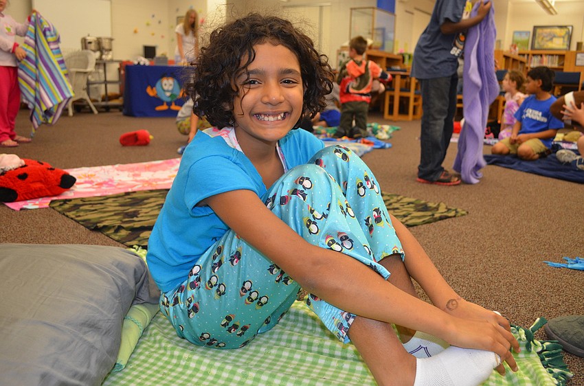Mya Perez, 11, brought her special blanket that her mother gave to her when she was young.