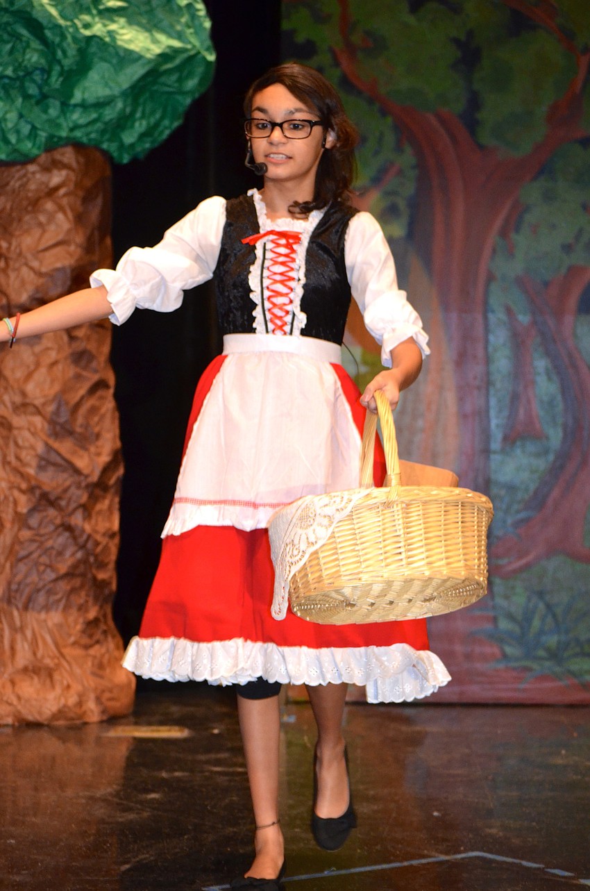 Chloe Burgos skips off to grandmother's house.