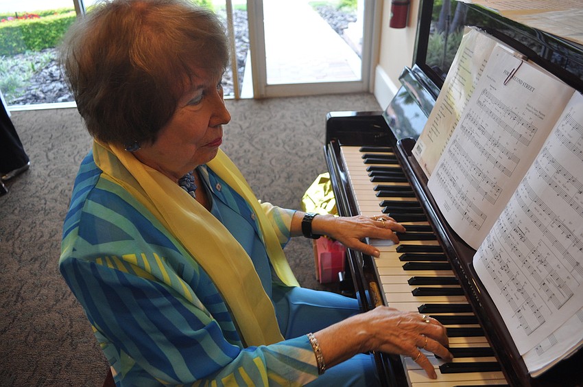 Marian Cox played music before and during the fashion show.