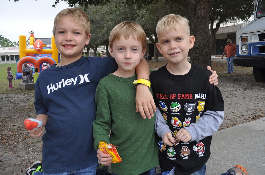 First grader Jake Cody with second-graders Chase Eickorn and Ronin Smith