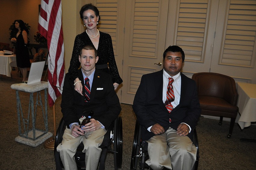 Wounded warriors Alex Dillman, with his wife, Holly, and Thongpane Thongden benefited from dollars raised by Rosedale's Military Ball in 2013 and 2014, respectively.