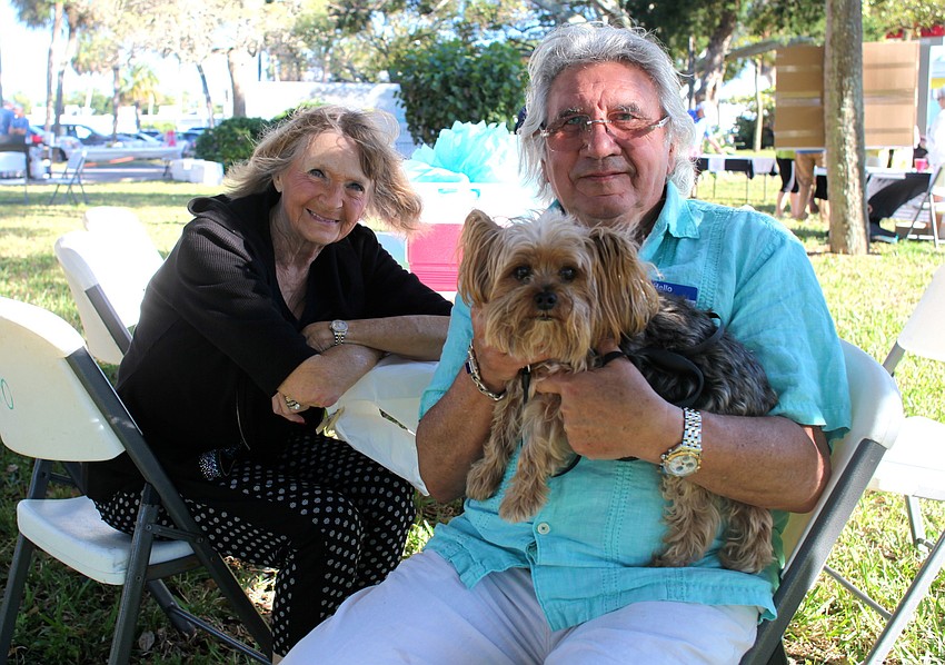 Joan and Mario Arcari with their 11-year-old Yorkie, Oliver.