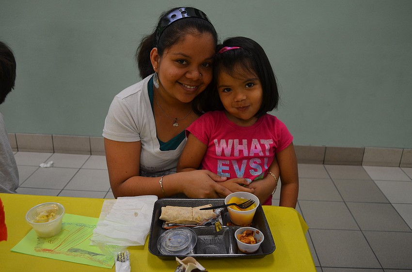 Yajaira and Bianca Abally enjoy their lunch together.
