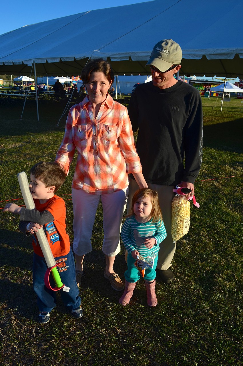 The McNeal family â€”Elijah, 4, Debra, J.D. and Jaclynn, 2.