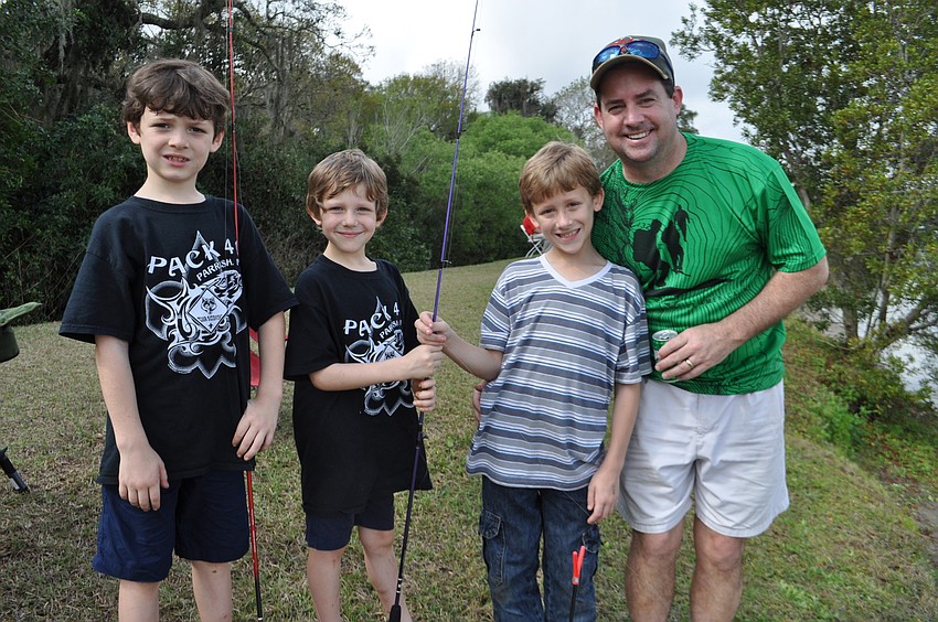 Peter Van Beuren, right, brings his sons, Jonathan, Andrew and Peter, from left to right.