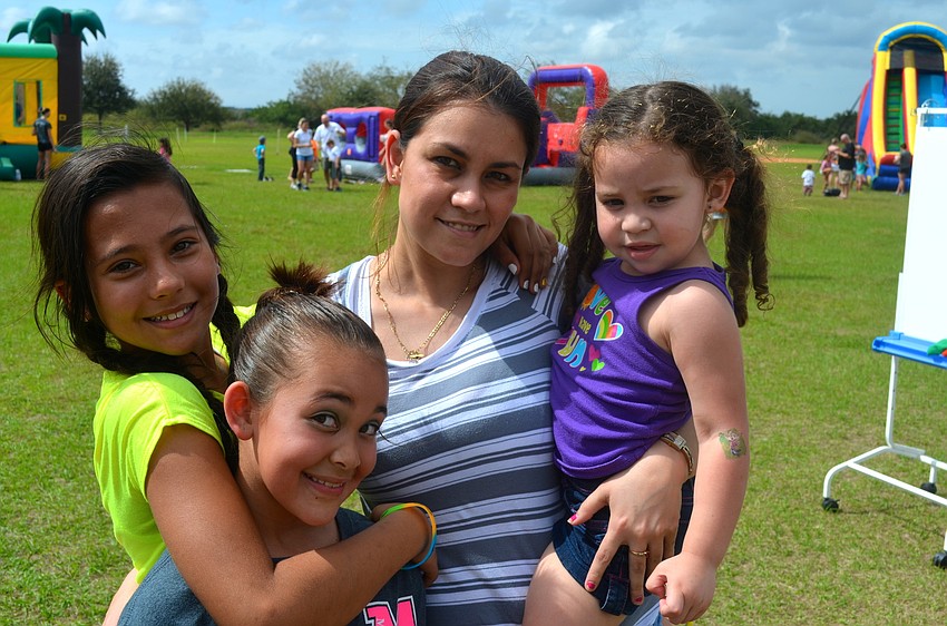 Iraliz Rodriguez, 11, Mercedes Colon, Kailyn Baldomi, 3, and Hennessy Luciano, 9.