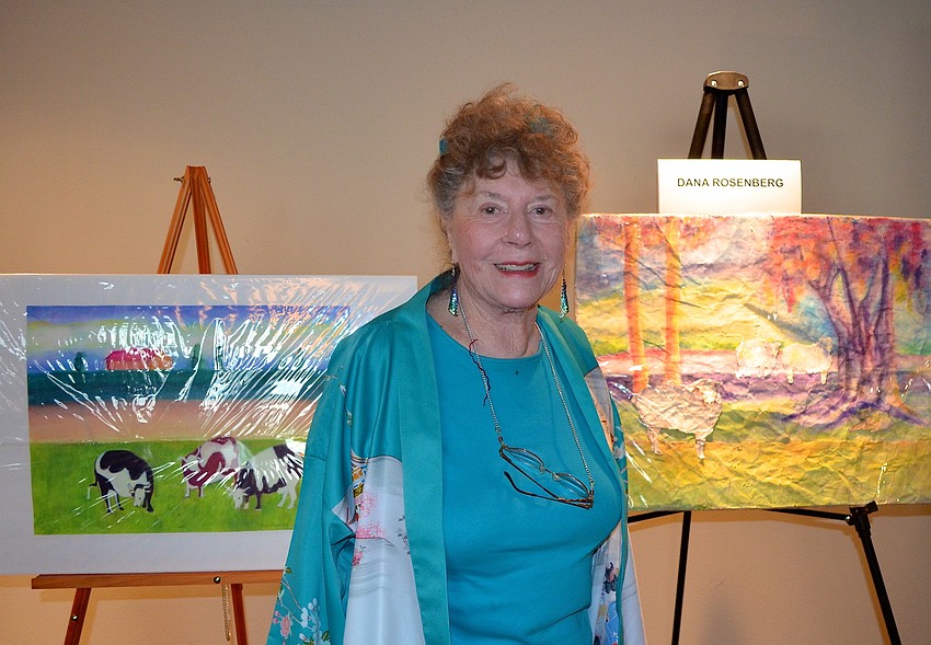 Dana Rosenberg displays her artwork at the show.