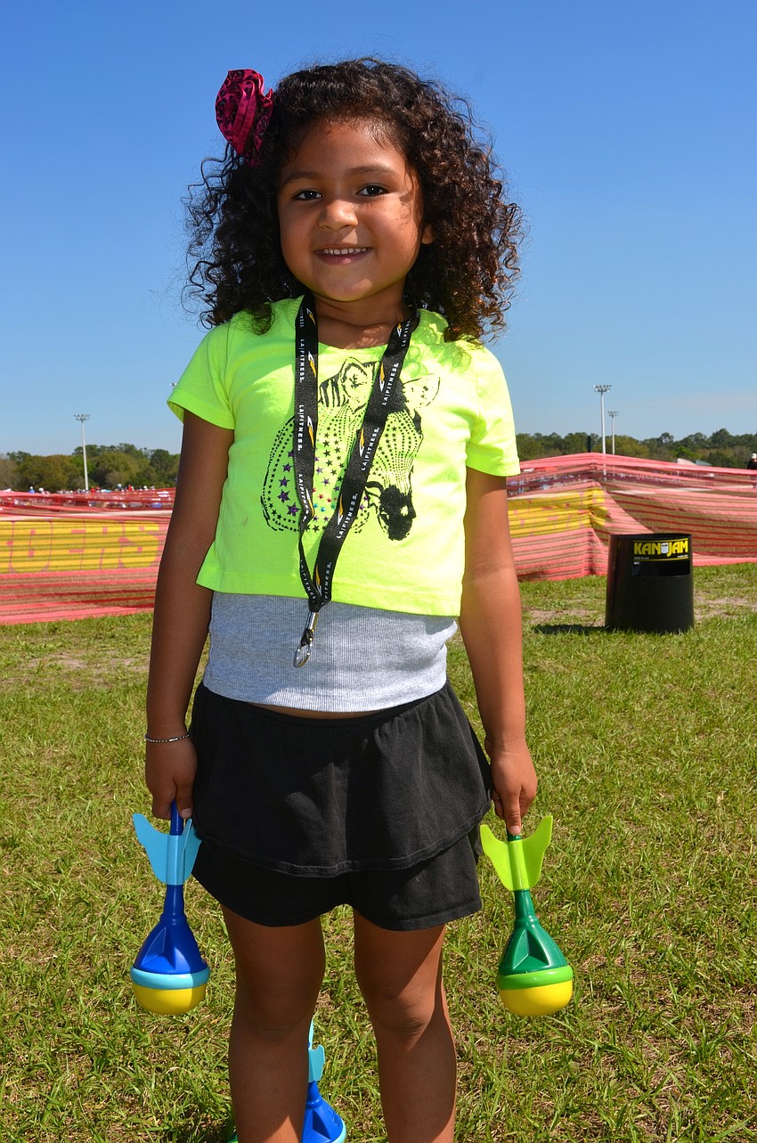 Eliana Sua, 5, enjoys playing games.