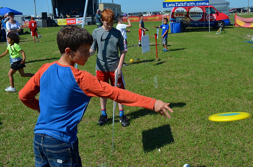Jaxson Crump, 10, shows off his Frisbee skills.
