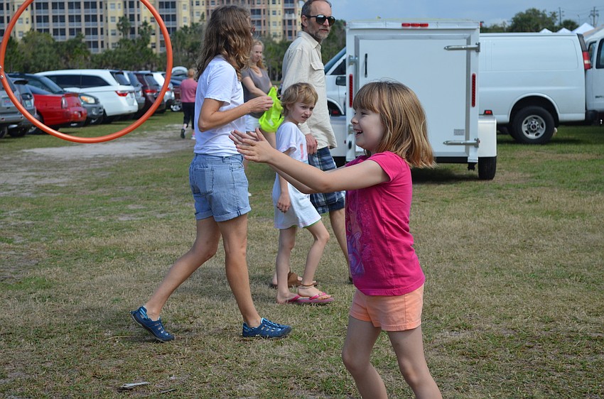 Peggy Altier plays with a hula hoop.
