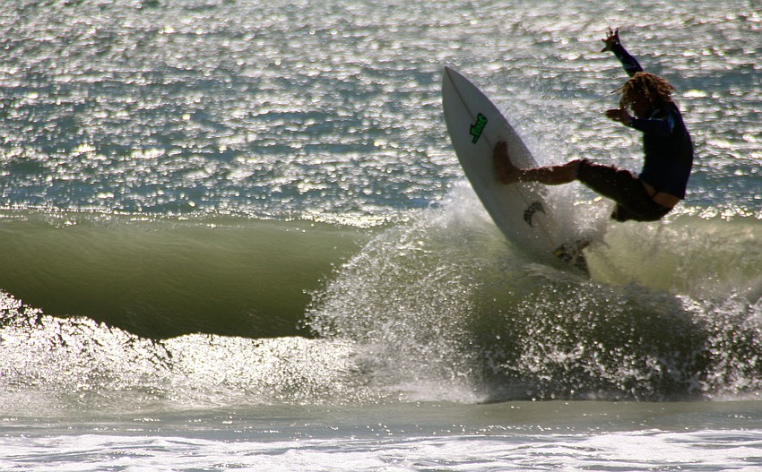 Surfers at Lido Beach.
