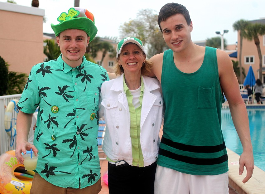 Chris Hagene poses between her sons, Josh and Grant.