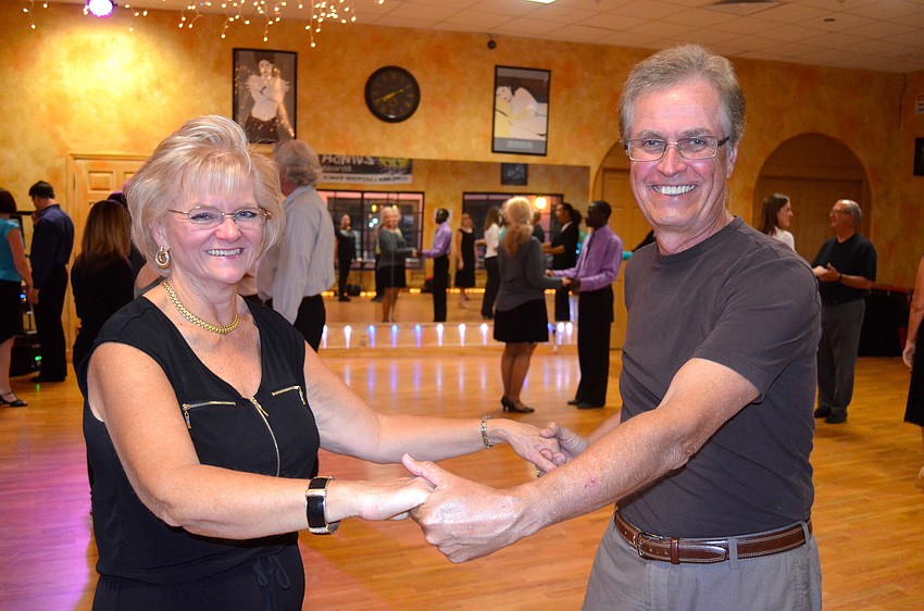 Nancy Wozniak and Rus Garvey learn to ballroom dance.