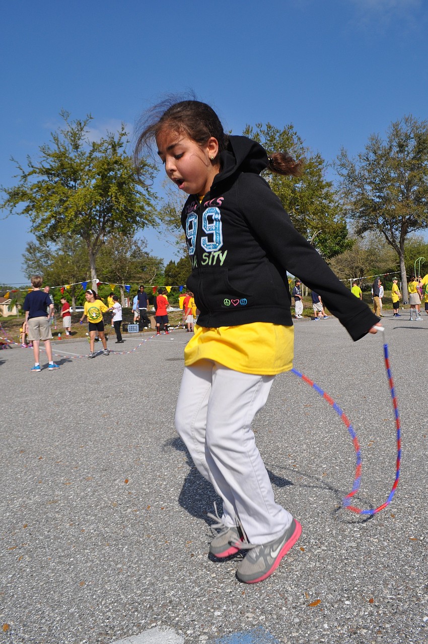 Hannah Samad, 11, practices jumping.