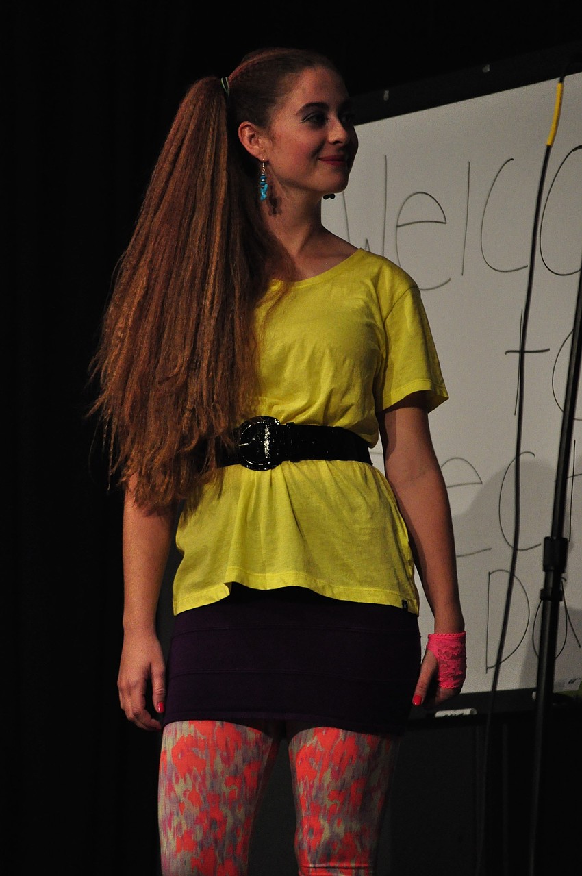 Emily Camire assists as a candidate shares his campaign intentions.