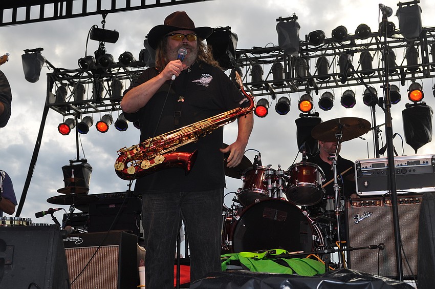 Jim Nelson of Jeff Cook & The AGB plays his â€œLady Libertyâ€ saxophone.